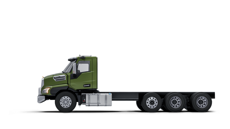 A green truck with four wheels AI-generated content may be incorrect.