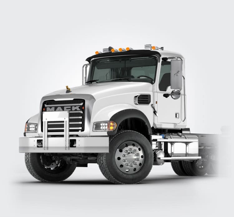 White Mack Granite truck with a bold grille and polished wheels